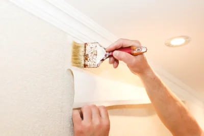 Pose de papier peint à Auradou — revêtements muraux et toiles de verre